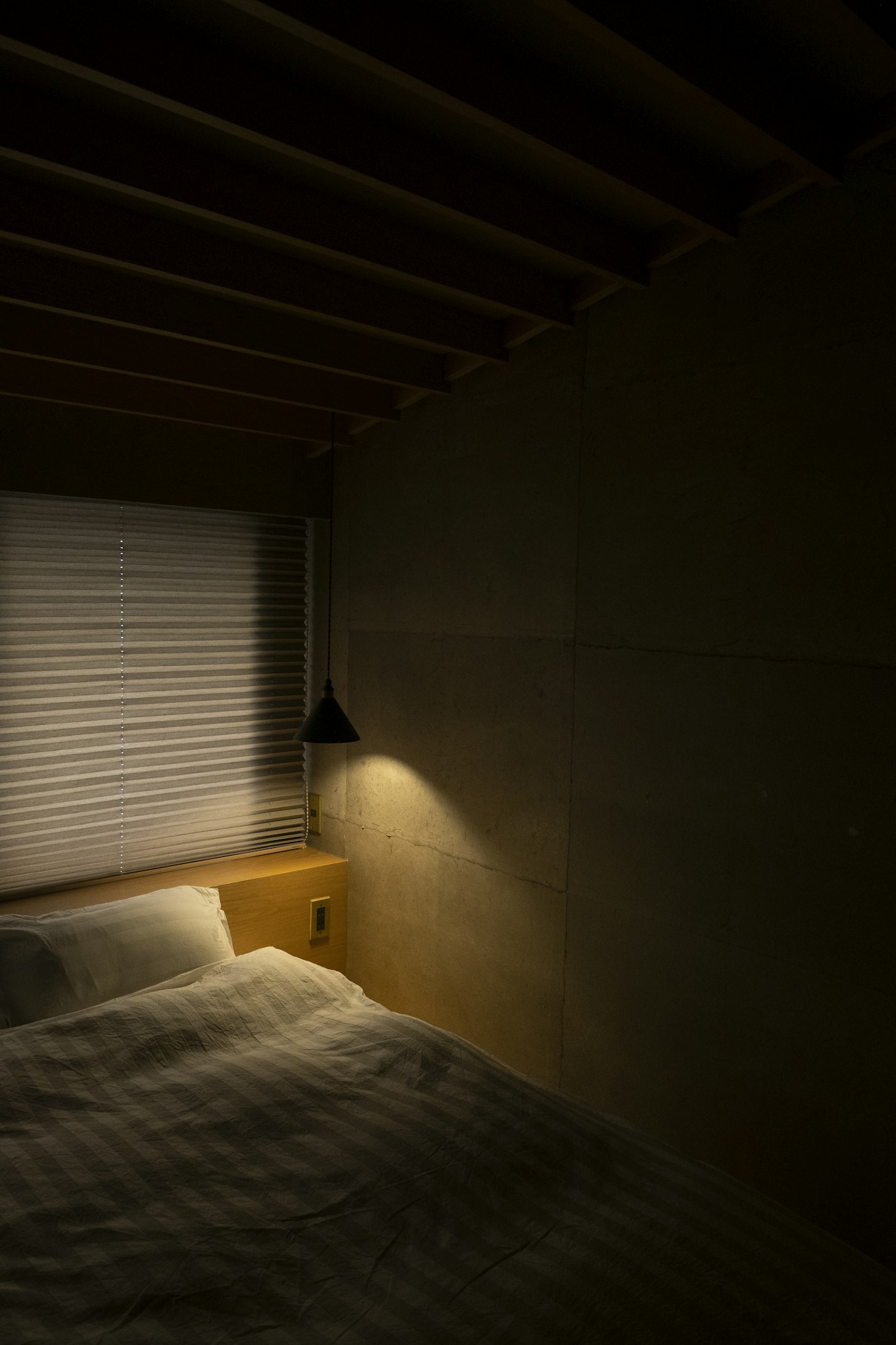 Minimalist Residence bedroom with white linen in Bangalore